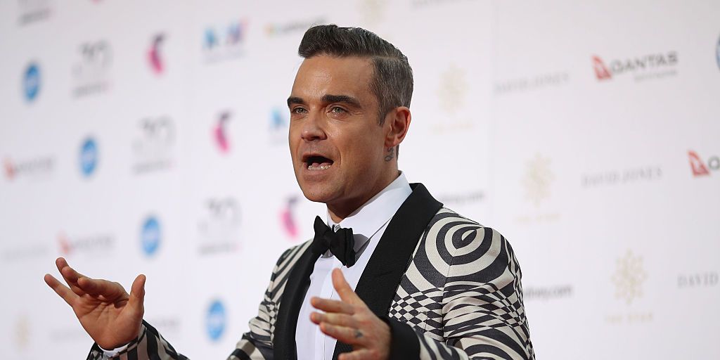 Robbie Williams admits Take That don't know where ex-bandmate Jason Orange is - www.digitalspy.com