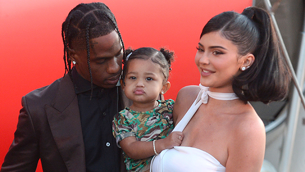 Travis Scott &amp; Kylie Jenner Cuddle Stormi, 1, In Green Party Dress At The Kardashian Christmas Eve Bash: See Pic - hollywoodlife.com