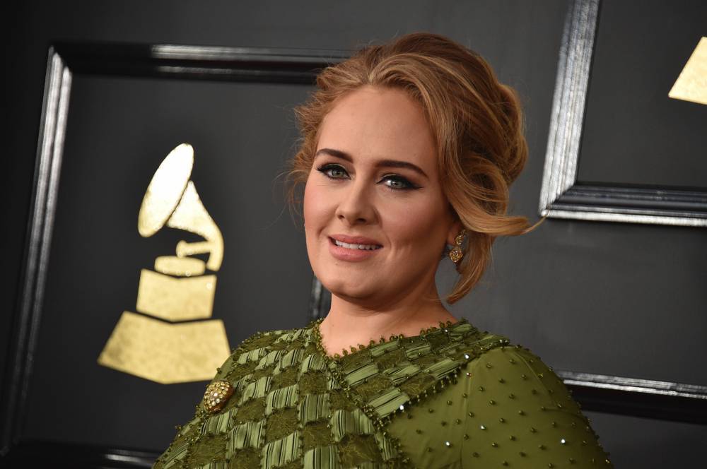 Adele told vacationing fan she lost 100 pounds: report - www.foxnews.com - state Massachusets - Anguilla