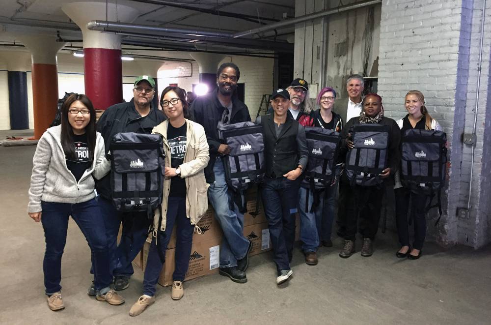 Leader Of The Pak: Paradigm Agent Ron Kaplan Delivers Custom Backpacks to the Neediest Among Us - www.billboard.com