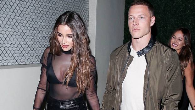 Olivia Culpo’s BF Christian McCaffrey Helps Her Squeeze Into Her Tight Leather Pants In Cute Video - hollywoodlife.com