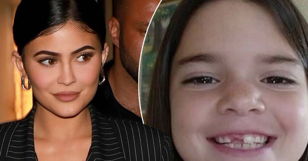 Kylie Jenner shares adorable throwback photo of older sister Kendall missing her front tooth - www.ok.co.uk