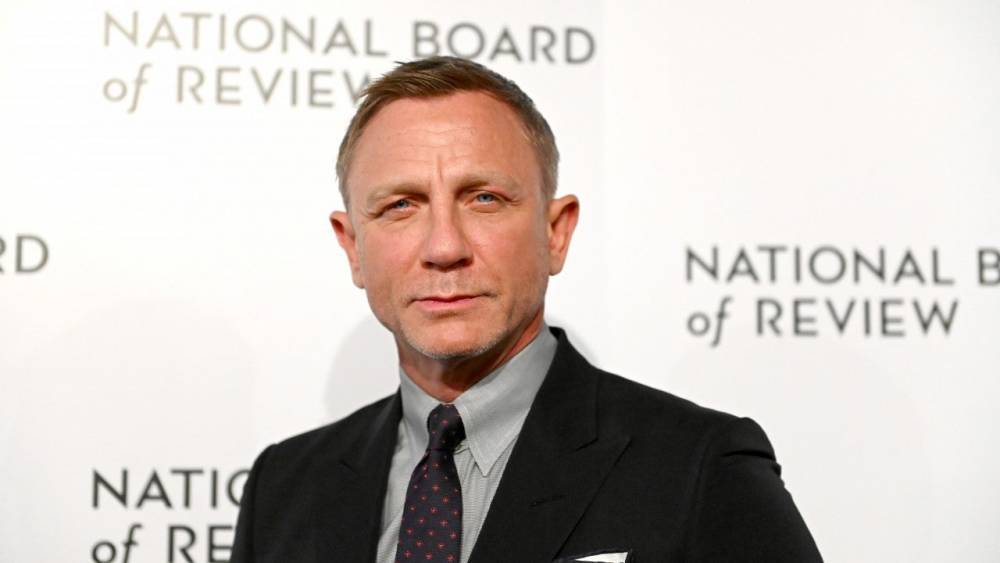 James Bond Producer Says 007 Will Never Be a Woman But 'Can Be of Any Color' - www.etonline.com