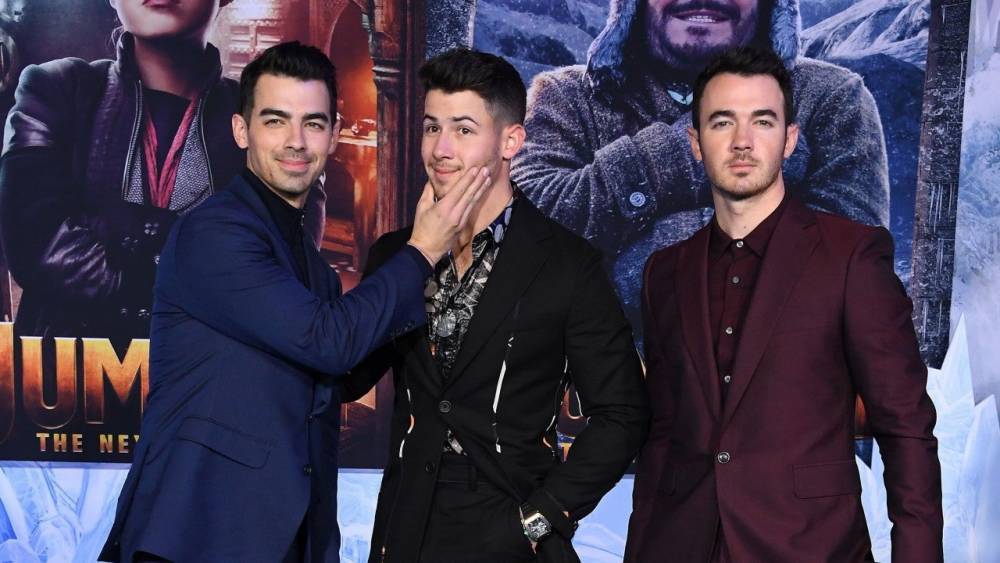 The Jonas Brothers' Wives Appear to Star in Upcoming Music Video - www.etonline.com