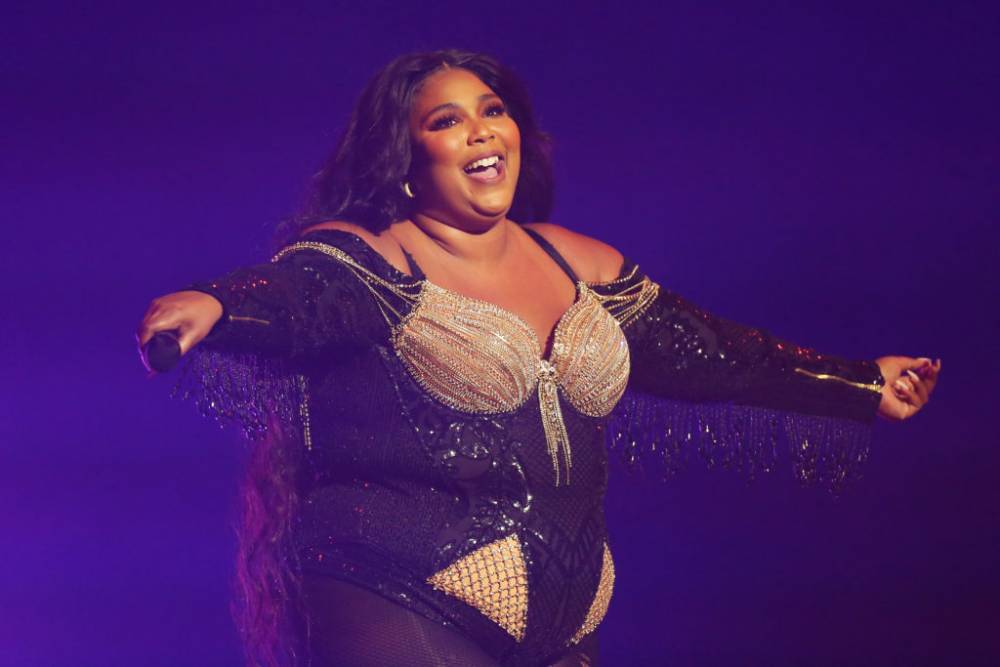 Lizzo Celebrates Some Big Wins In A Spicy Bathing Suit! - theshaderoom.com