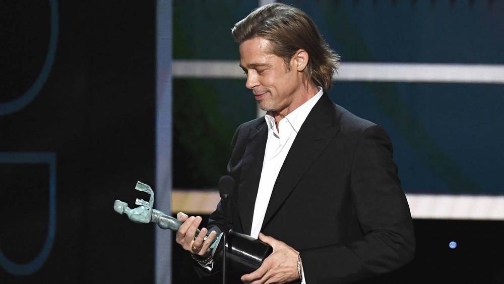 Brad Pitt Wins SAG Award, Jokes "I've Got to Add This to My Tinder Profile" - www.hollywoodreporter.com - Hollywood