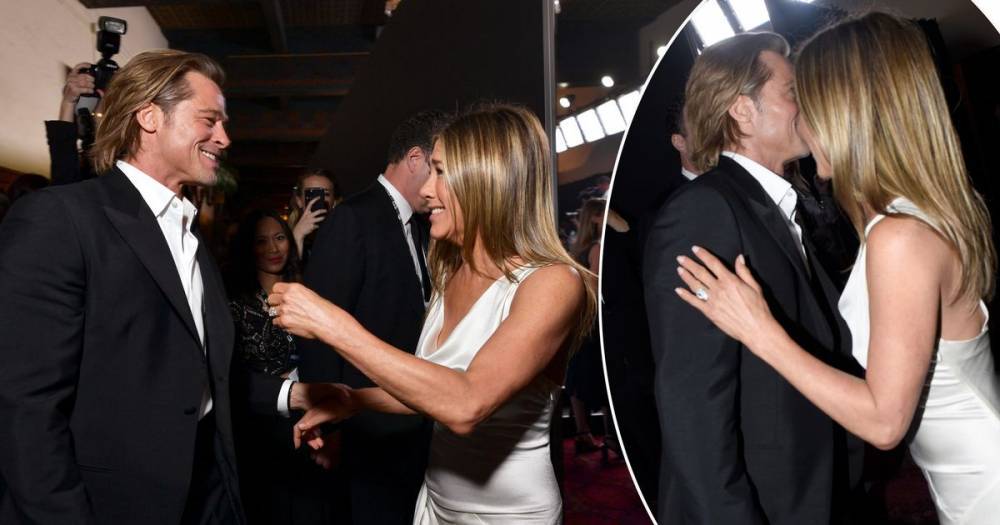 Brad Pitt and Jennifer Aniston send fans wild as they share kiss and hold hands at SAG Awards - www.ok.co.uk