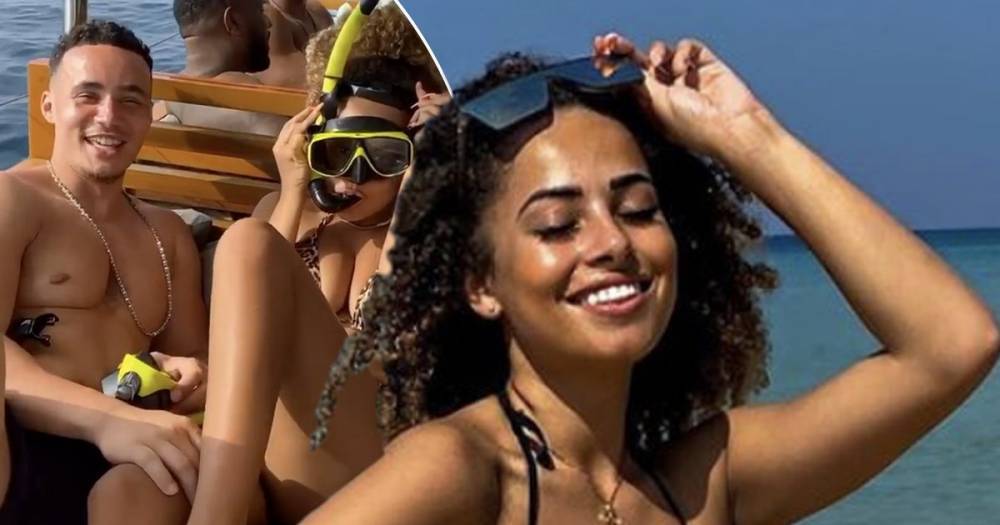 Amber Gill spotted cosying up to mystery man after missing her flight home from Thailand for party - www.ok.co.uk