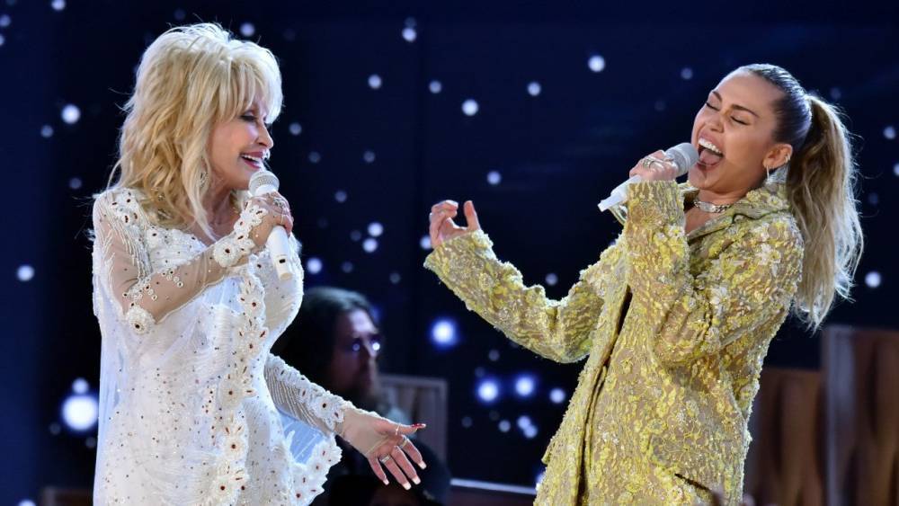 Miley Cyrus Celebrates Godmother Dolly Parton’s Birthday With Fun Dress Up Videos - www.etonline.com