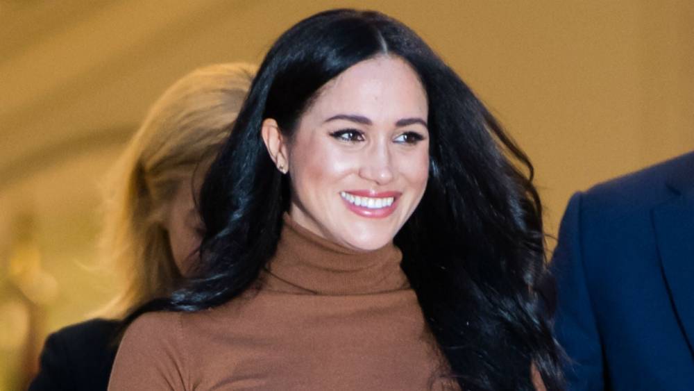 Meghan Markle Is All Smiles During Stroll With Archie After Royal Exit - www.etonline.com - Canada