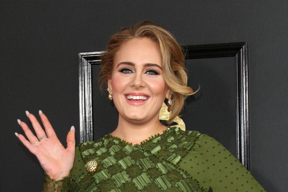 Adele teases comeback with mysterious new YouTube clip - www.hollywood.com