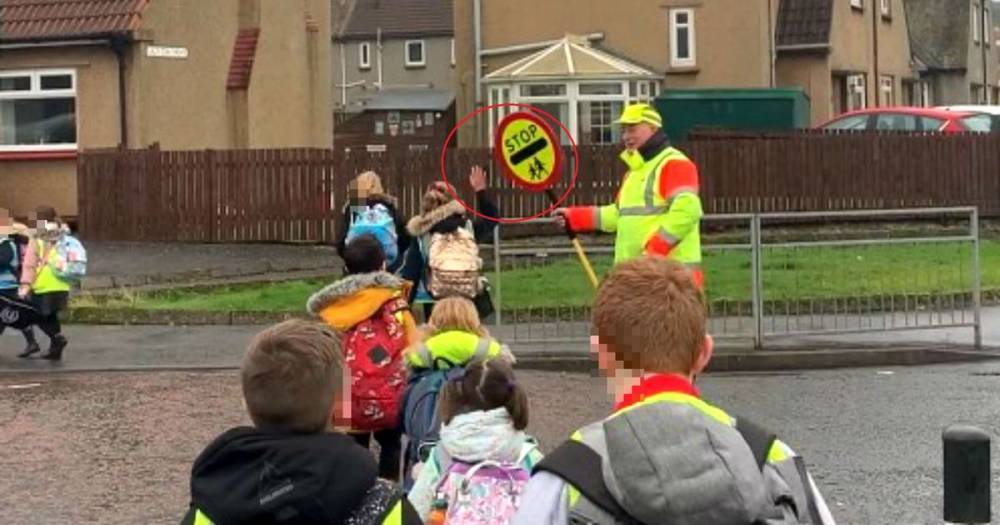 Scots lollipop man banned from high-fiving kids after ONE complaint - www.dailyrecord.co.uk