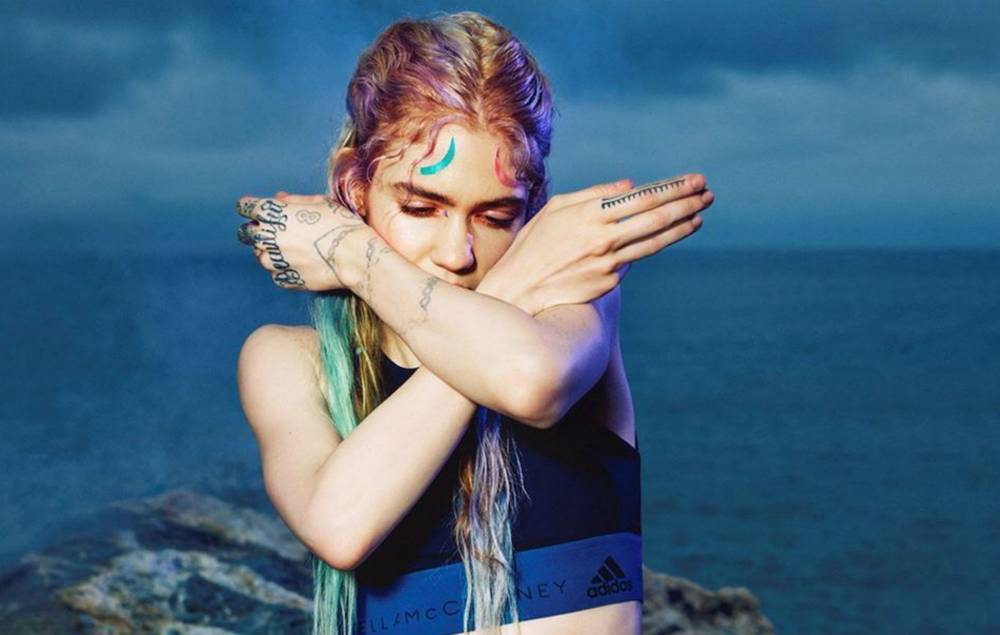 Grimes creates ‘WarNymph’ social media profiles for her unborn baby - www.nme.com