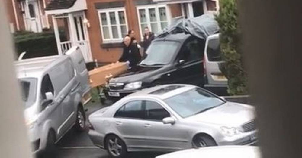 'Oh my God': Neighbour's reaction as coffin removed from a home at the centre of an ongoing police investigation - a man has been arrested - www.manchestereveningnews.co.uk