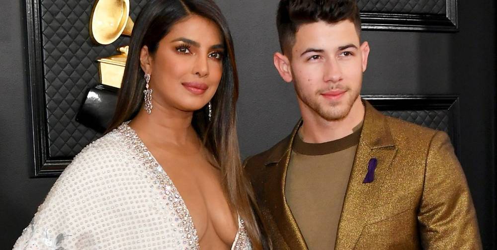 Priyanka Chopra and Nick Jonas Went All Out in a Plunge Dress and Gold Suit at the Grammys - www.marieclaire.com