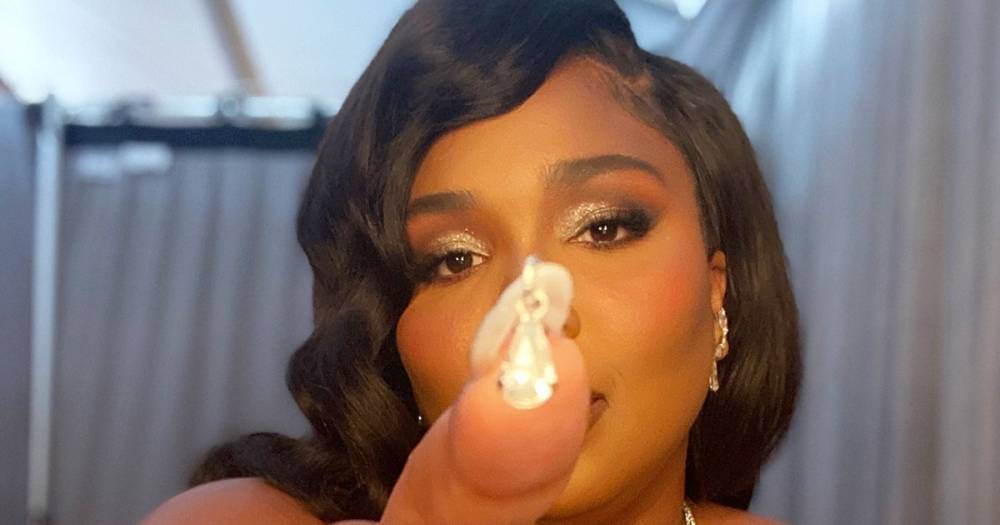 All the Details on Lizzo’s Hair, Makeup and Nail Art at the 2020 Grammy Awards - www.usmagazine.com