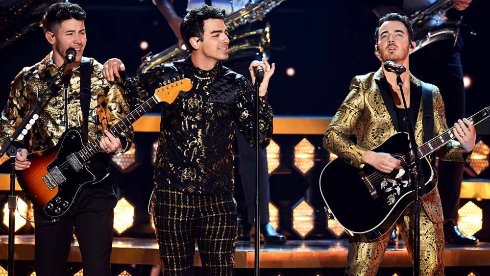Grammys: Jonas Brothers Perform New Single "What a Man Gotta Do" - www.hollywoodreporter.com