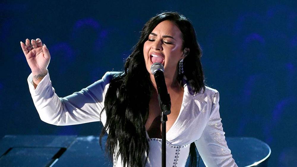 Grammys: Demi Lovato Performs for First Time Since Overdose Scare - www.hollywoodreporter.com - county Love