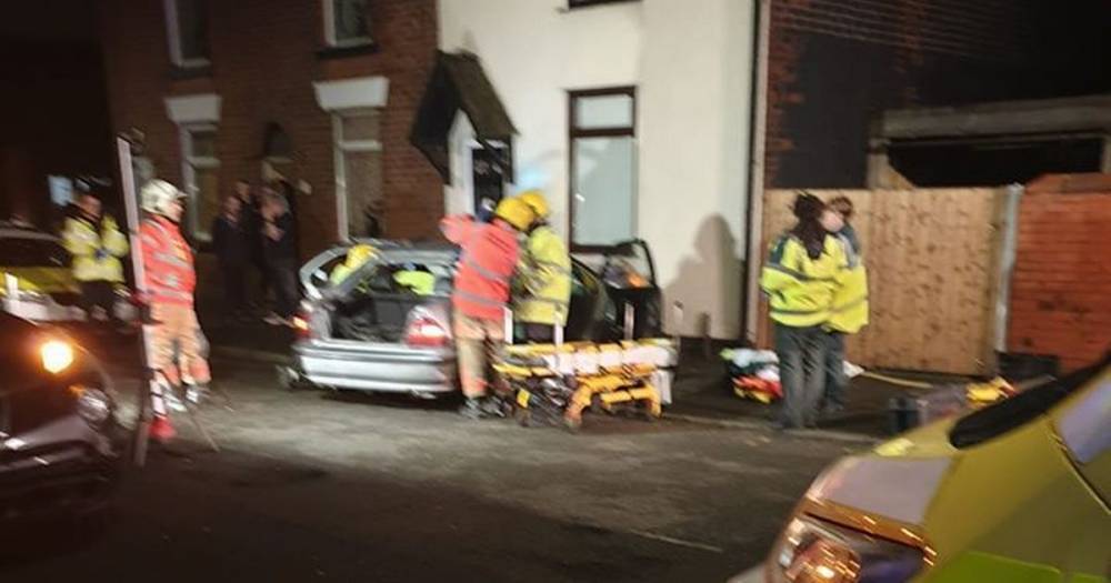 Two women taken to hospital after car smashes into house - www.manchestereveningnews.co.uk