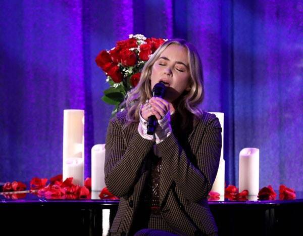 Watch Emily Blunt Beg For Chris Martin’s Forgiveness With An Epic Song - www.eonline.com