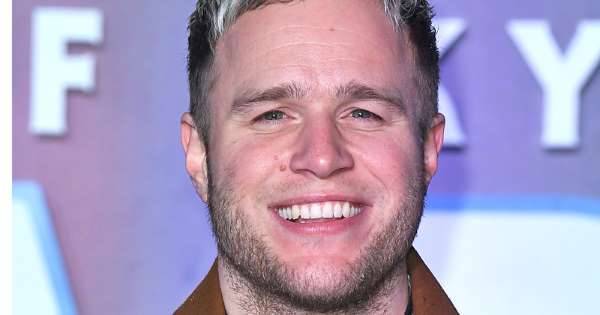 Olly Murs gives fans a rare insight into his relationship with girlfriend Amelia - www.msn.com - Britain