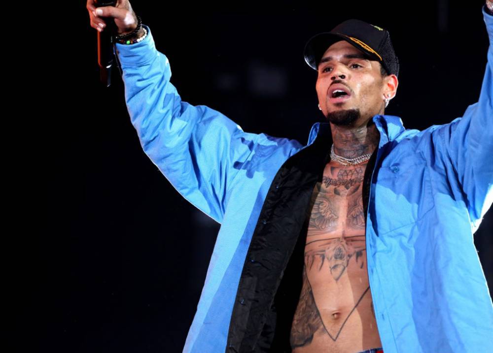 K-Pop Star Backtracks On Being A Chris Brown Fan After Being Called Out For Taking A Photo With Him - theshaderoom.com