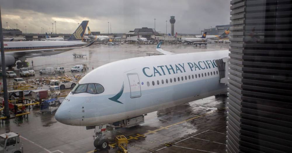 Cathay Pacific reduce flights to mainland China by more than half due to coronavirus - www.manchestereveningnews.co.uk - Britain - China - Hong Kong - city Wuhan