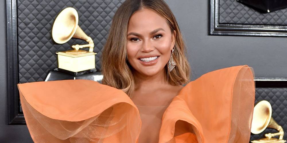Chrissy Teigen Just Acted Out 'Luigi's Mansion 3' on the Set of a Shoot - www.marieclaire.com