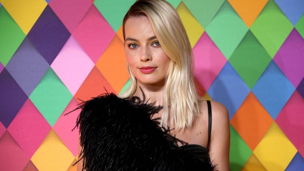 Margot Robbie on the Surprising Way She and Her Friends Get Over Breakups (Exclusive) - www.etonline.com