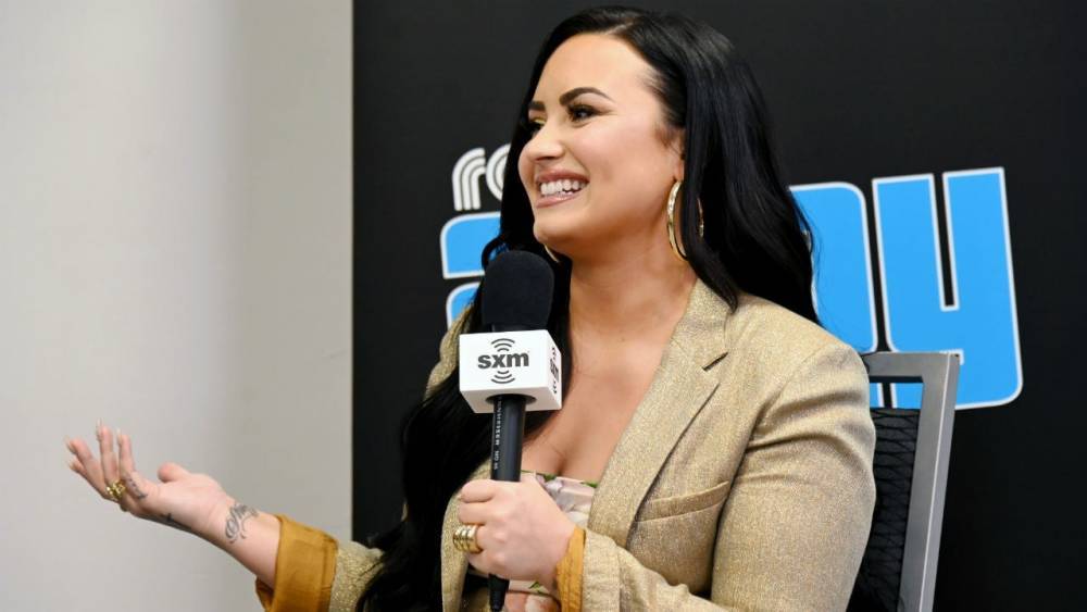 Demi Lovato Talks About the 'Really Beautiful' Moment She Came Out to Her Parents - www.etonline.com