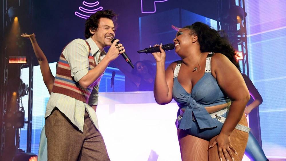 Harry Styles Surprises Lizzo Fans on Stage at Pre-Super Bowl Concert: Watch! - www.etonline.com - Britain