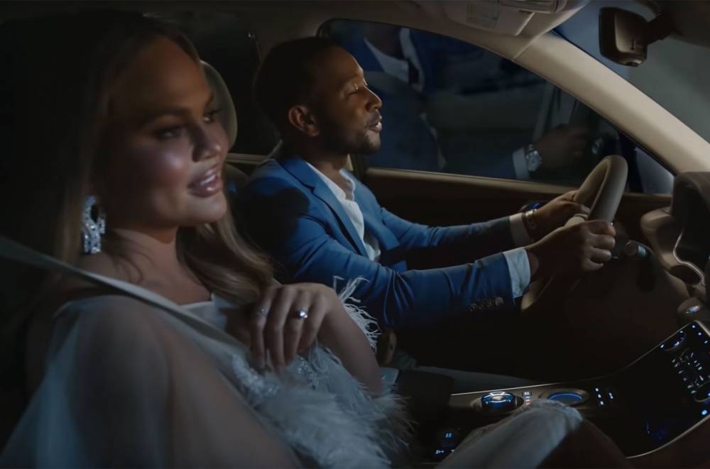 John Legend Teases Chrissy Teigen About 'Sexiest Man Alive' Title in Genesis Super Bowl 2020 Ad - www.billboard.com