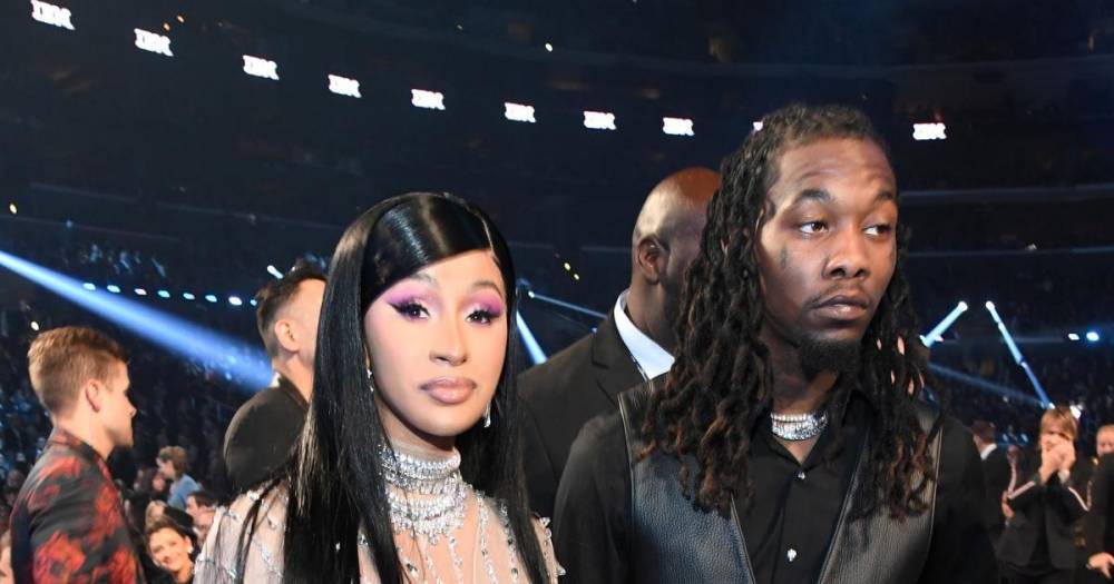 Offset punches man for spraying champagne on Cardi B - www.wonderwall.com - Miami