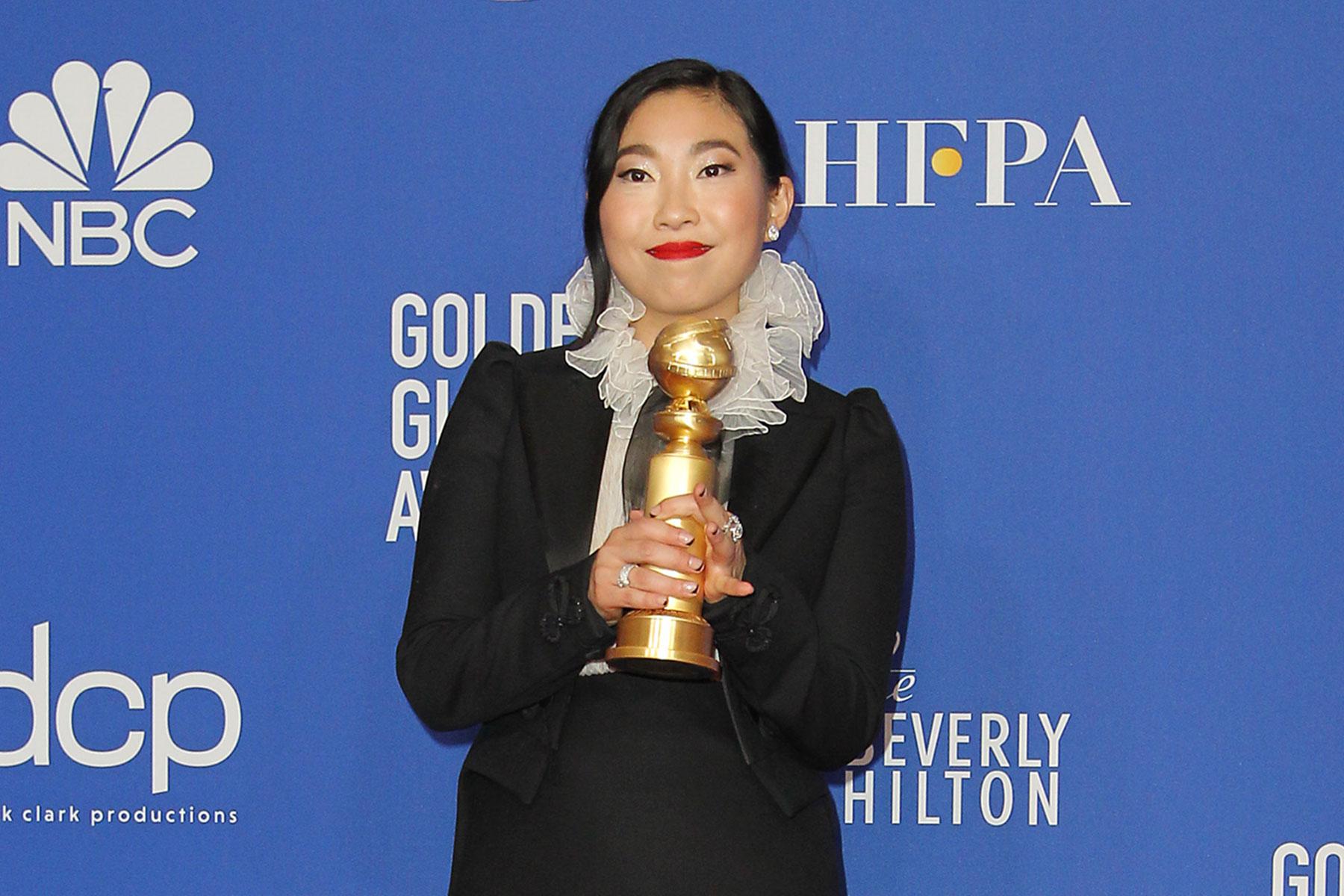 Awkwafina makes history at Golden Globes - www.hollywood.com - USA