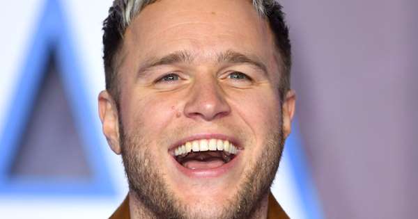 Fans thrilled for Olly Murs after he shares photo of his stunning new girlfriend - www.msn.com - Britain