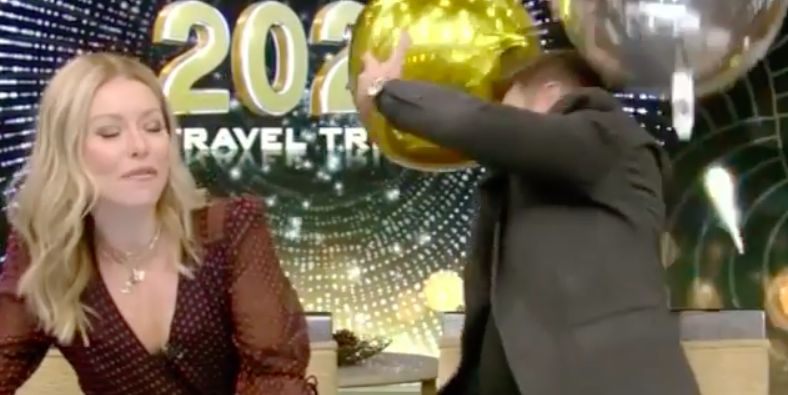 Watch Ryan Seacrest Fall Off His Chair on Live TV While Trying to Catch a Balloon - www.cosmopolitan.com