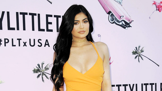 Kylie Jenner Rocks Skintight Orange Jumpsuit In Mirror Selfie Inside Her Huge Purse Closet — See Pic - hollywoodlife.com