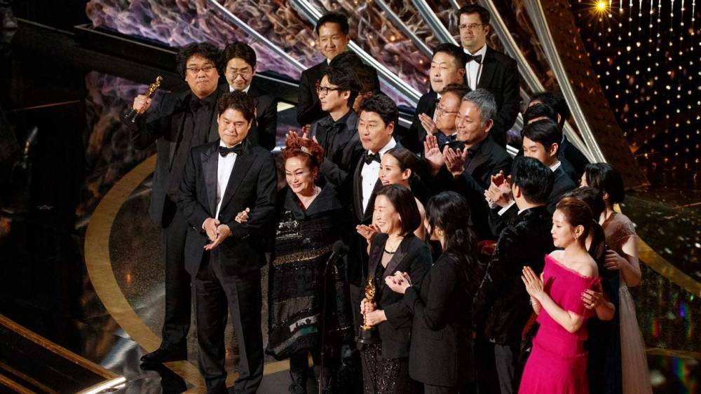 Tom Hanks, Charlize Theron and More Chant to Keep 'Parasite' Oscars Acceptance Speech Going - www.etonline.com - North Korea