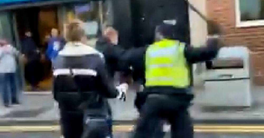 Football fan aged 16 battered on head by cop in shock video as watchdog order probe - www.dailyrecord.co.uk