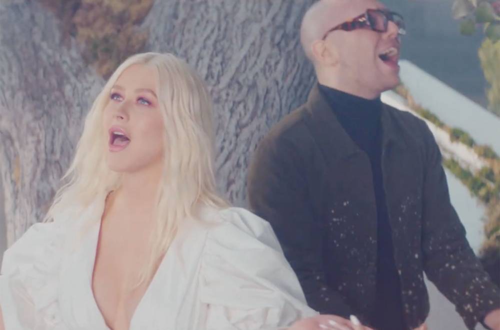 Christina Aguilera Makes Spring Come Early in Video For a Great Big World Collab 'Fall On Me': Watch - www.billboard.com - Chad