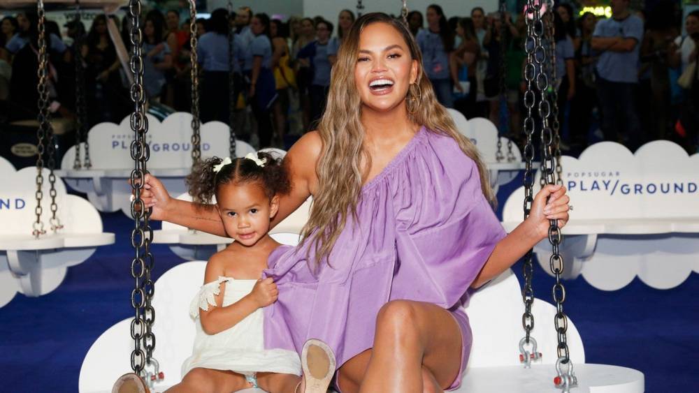 Chrissy Teigen and Daughter Luna Pose in Matching Outfits for New Sunglasses Collection - www.etonline.com