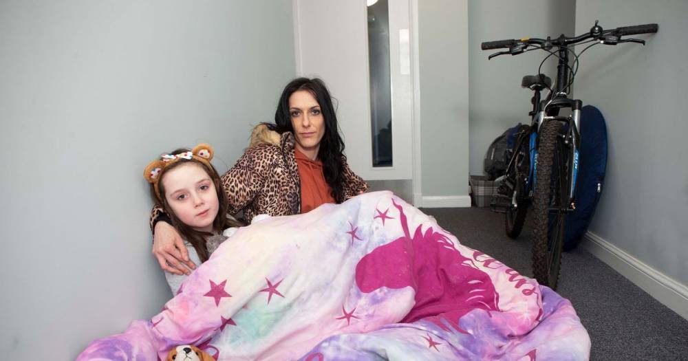 Single mum and daughter forced to sleep on 'freezing' stairwell after flat floods - www.dailyrecord.co.uk - county Fisher