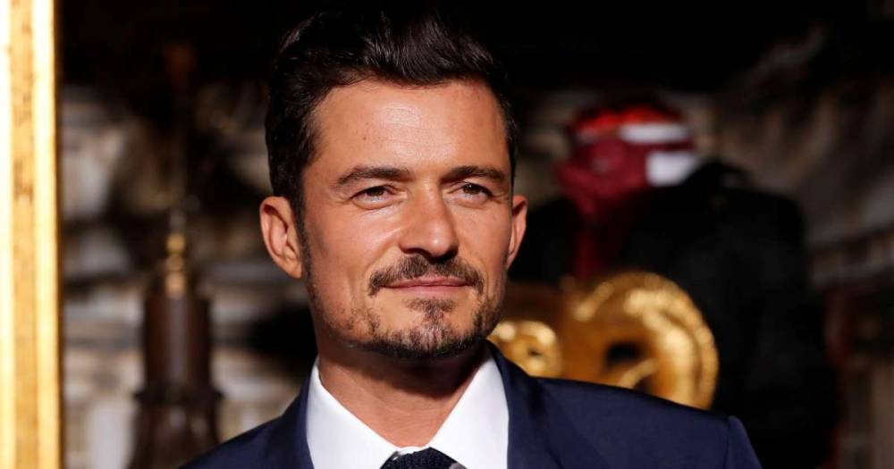 Orlando Bloom reveals new tattoo as he gets his son Flynn's name written in Morse code across his arm - www.msn.com - California