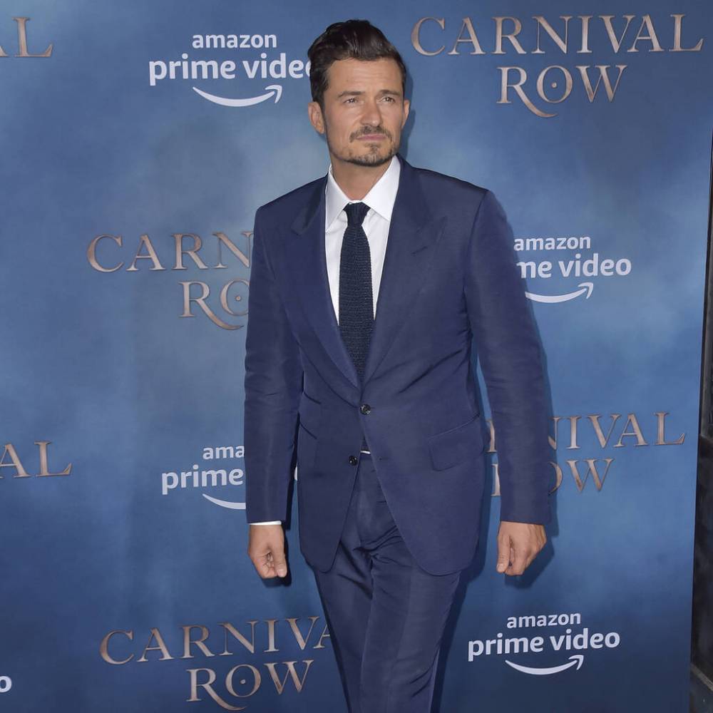 Orlando Bloom celebrates son Flynn with Morse code tattoo - www.peoplemagazine.co.za