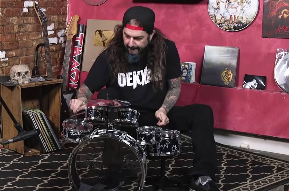 Watch Drummer Mike Portnoy Pay Tribute to Rush's Neil Peart on a Tiny, Tiny Drum Kit - www.billboard.com