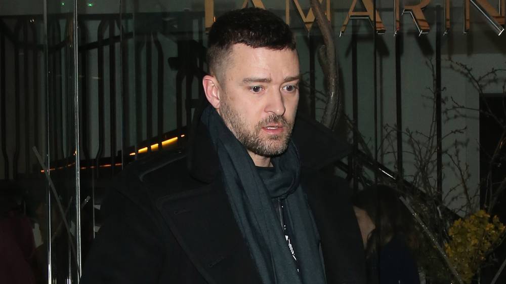 Justin Timberlake Enjoys Night Out with Friends in London - www.justjared.com - London