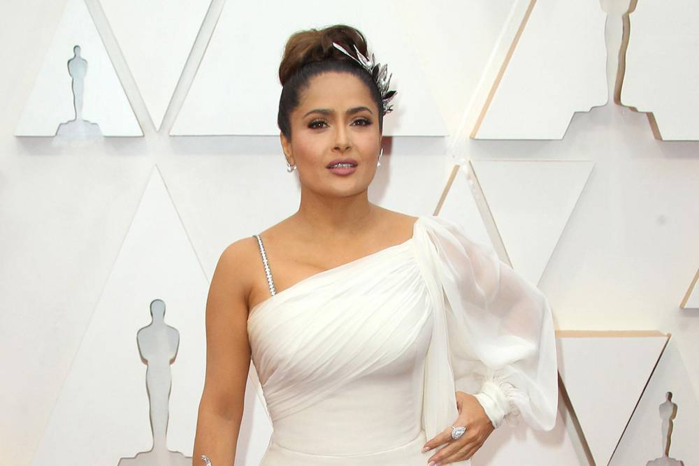 Salma Hayek still red-faced about all-wet meeting with hero Eminem at the Oscars - www.hollywood.com - Mexico