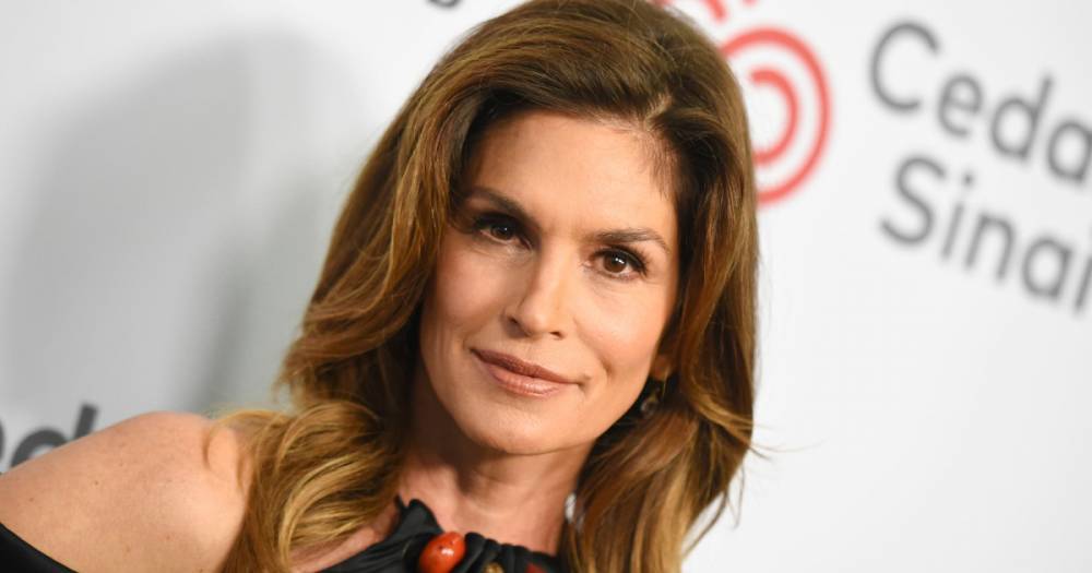 Cindy Crawford’s Secret for Shiny Hair Is This Dual-Action Oil - www.usmagazine.com