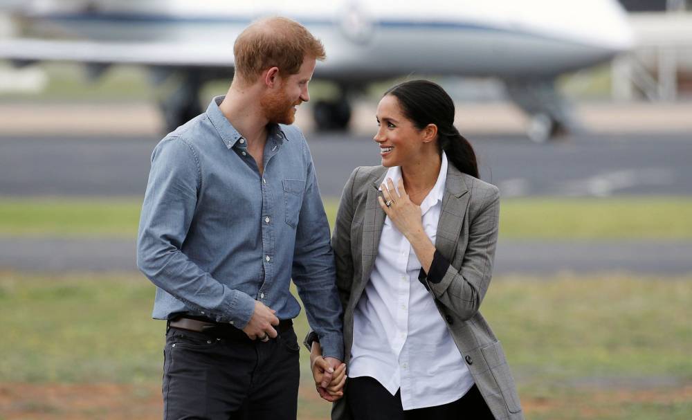 Prince Harry and Meghan Markle Are Apparently "Besotted" With Each Other Amid Their Royal Exit - flipboard.com