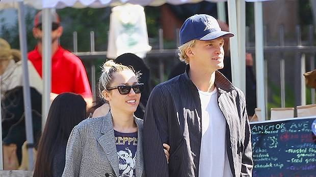 Miley Cyrus Cody Simpson Lock Arms Smile At One Another During Romantic Outing — Pics - hollywoodlife.com